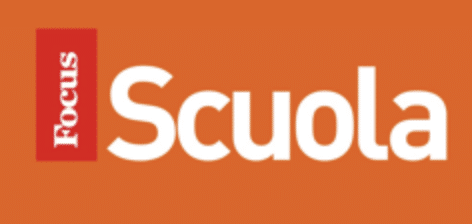 Focus Scuola Logo; Entire Logo a giant orange rectangular block. Inside it and to the left, Focus written vertically in white, inside of a red rectangle. To the right, Scuola written in white against the orange background.