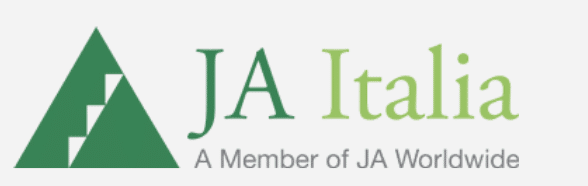 Logo for Junior Achievement Italia; big green triangle with a smaller green triangle inside that has white steps going up one of the sides. JA Italia in words off to the right
