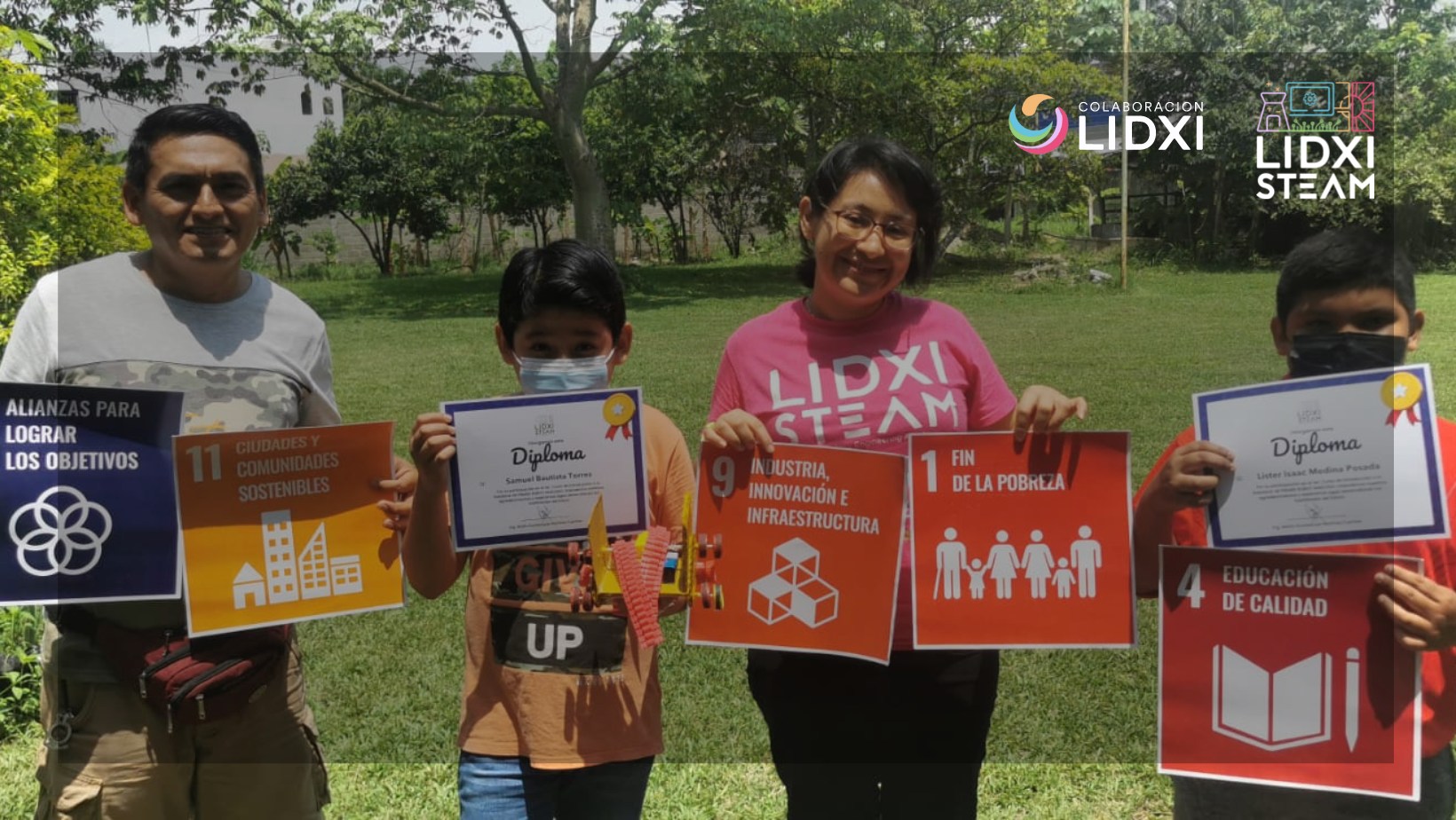 Un hombre, un niño, una mujer y otro niño aparecen en la imagen con carteles en la mano que muestran los Objetivos de Desarrollo Sostenible
