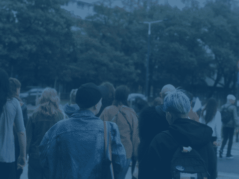 Crowd of people walking on the street