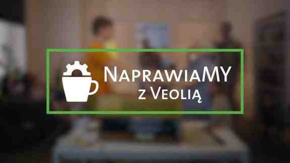 logo Naprawiamy z Veolią in the background blury photo from repair cafe