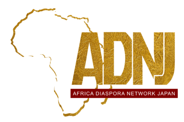 Logo featuring the gold-colored silhouette of the African continent with bold, textured gold letters ‘ADNJ’ overlaid. Below the letters, a red banner reads ‘Africa Diaspora Network Japan’ in white text.