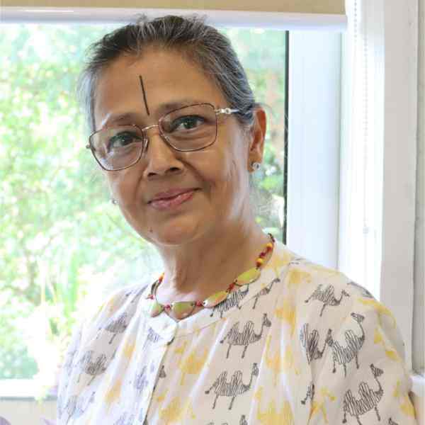 Senior Fellow Doctor Kiran Modi, she is an Indian woman with dark hair wearing glasses