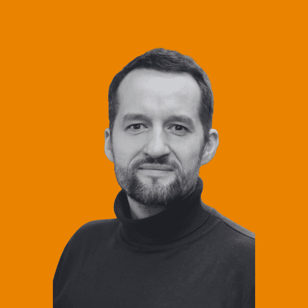 A man in a black turtleneck 
