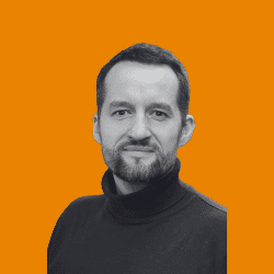 A man in a black turtleneck 
