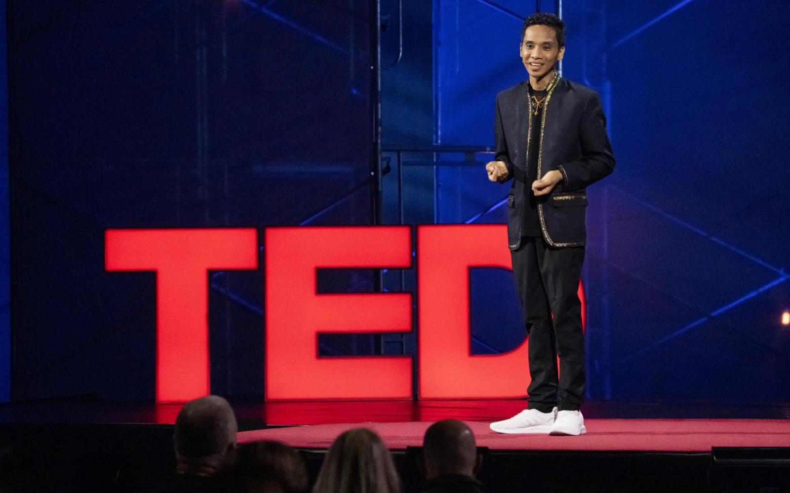Ashoka Fellow Ryan Gersava speaking before the TED logo 