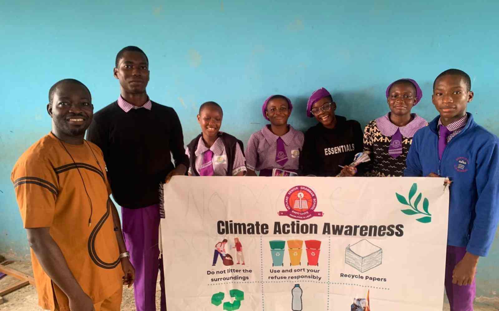 A group of students and teachers in a climate club