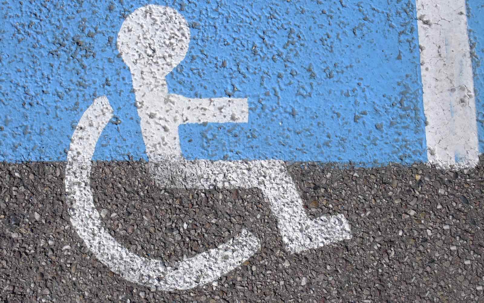 Gráfico de persona en silla de ruedas