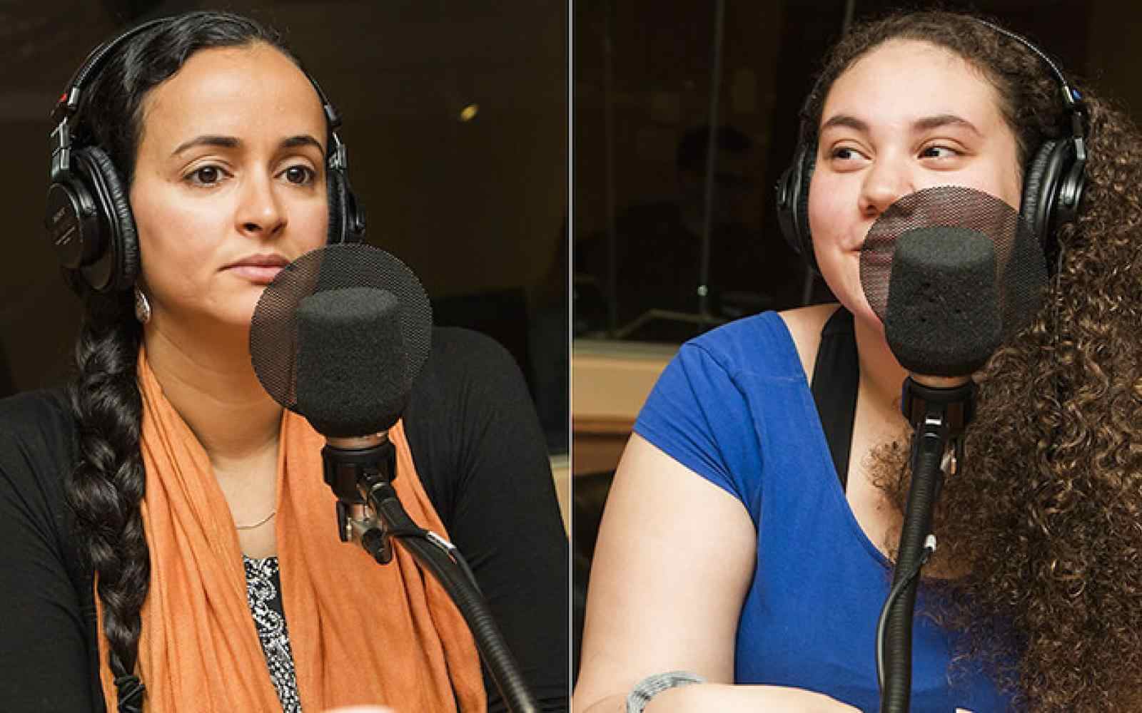 Two young women speaking into microphones with headphones on