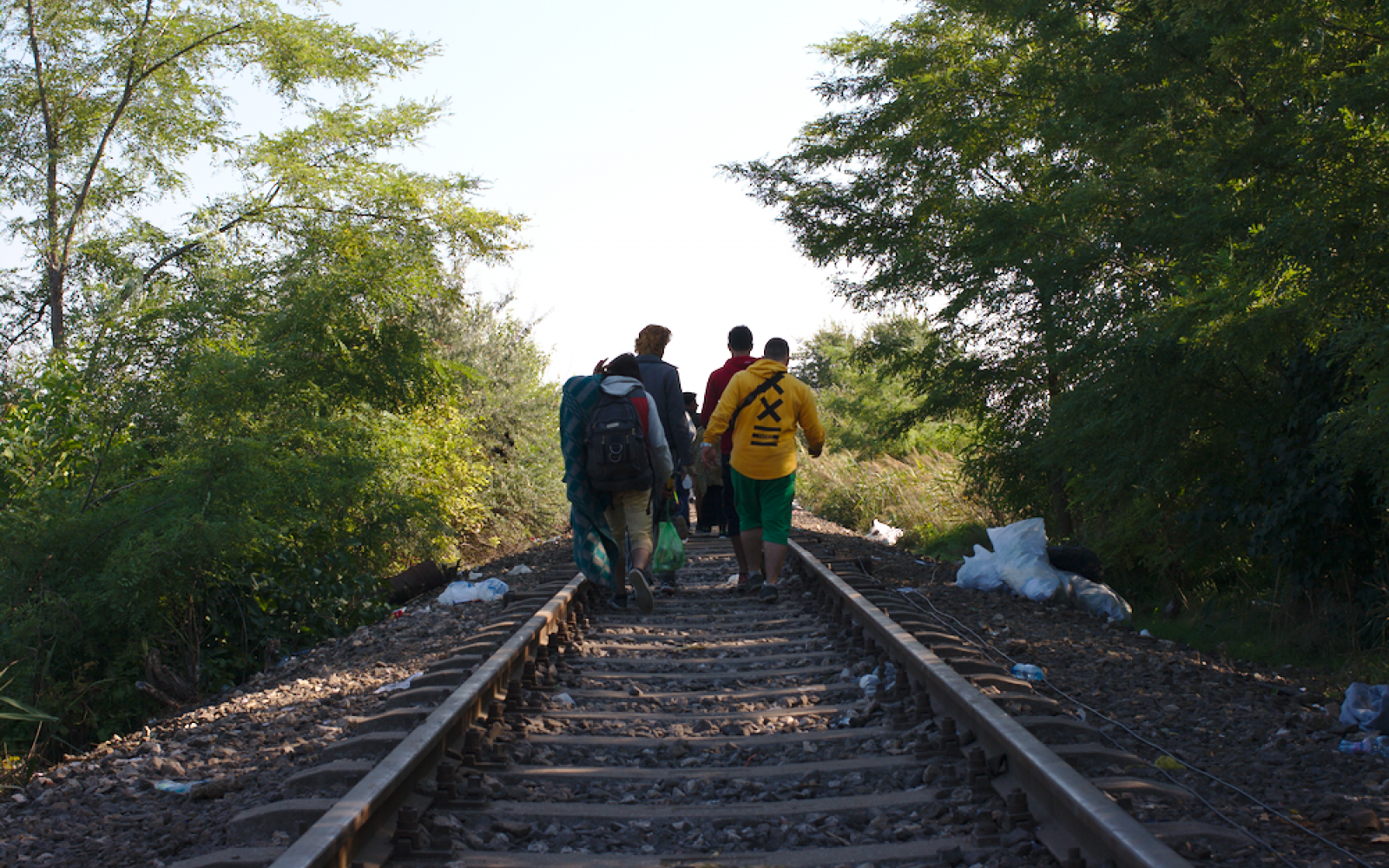 Refugees on railroad tracks