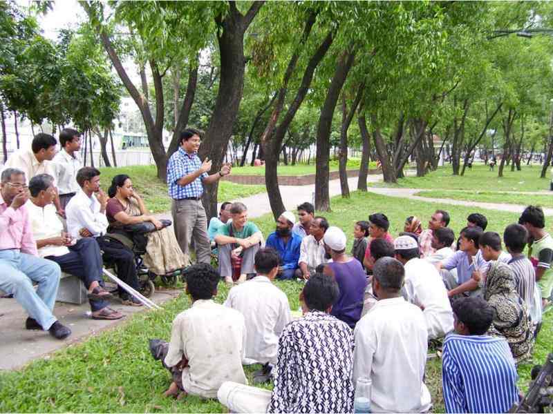 Albert Mollah motivating street peddler with disabillities