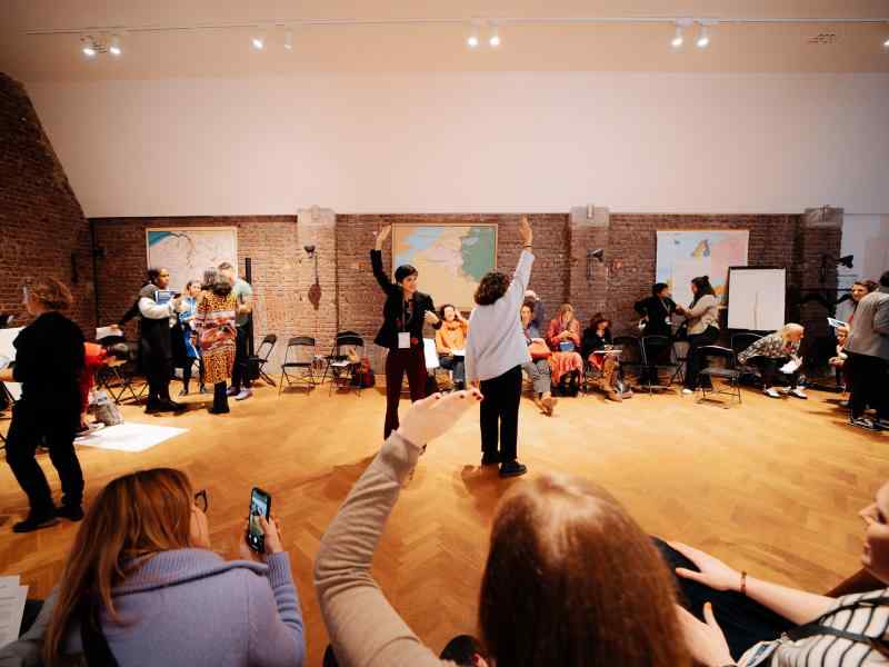 People in a cirle in a workshop room