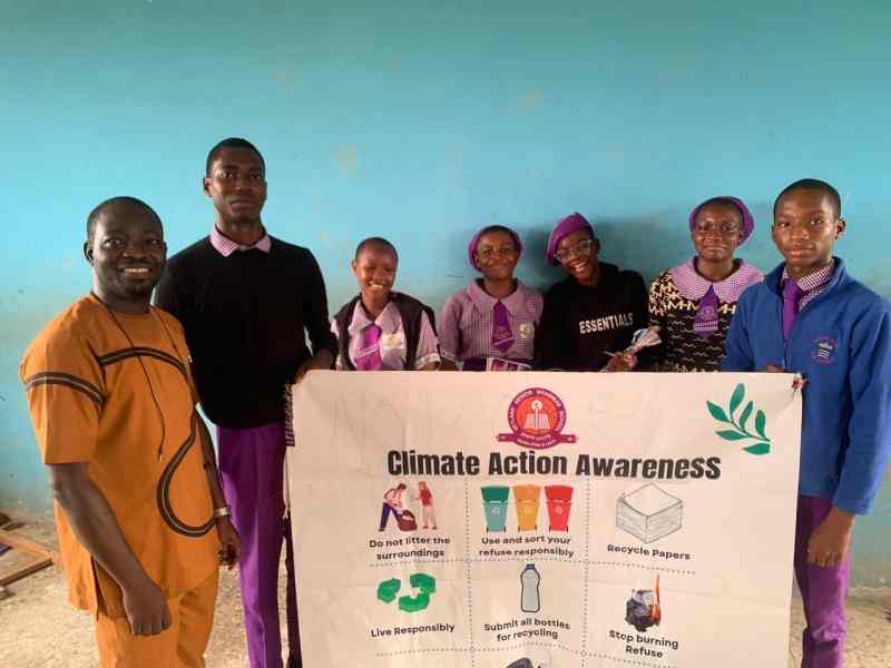 A group of students and teachers in a climate club
