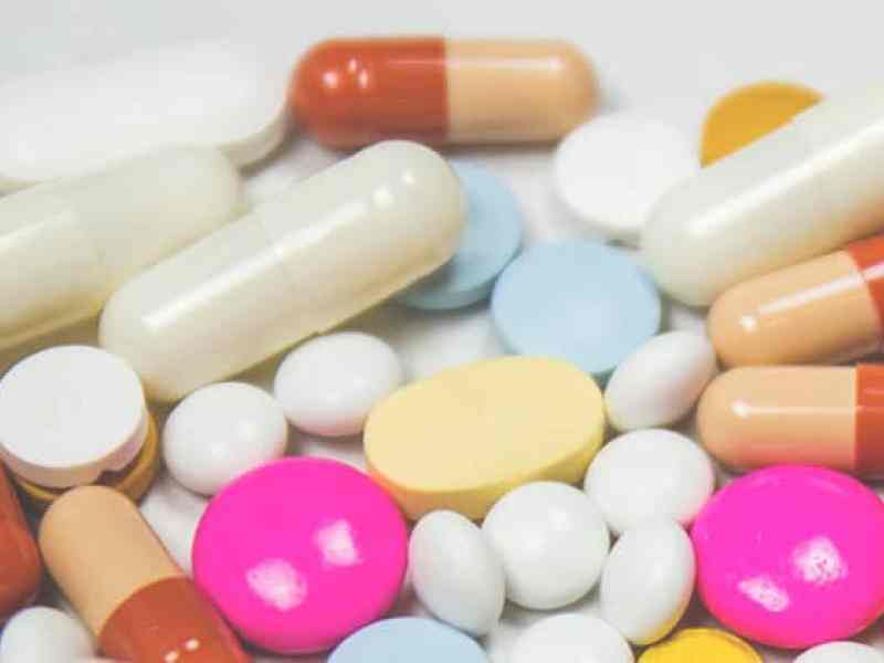 Photo of pills on a desk